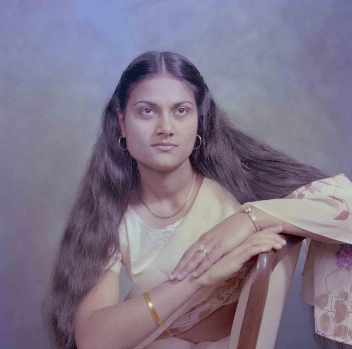 [Photo of Surjit Kingra]