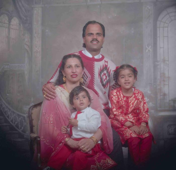 [Photo of Balwant Kingra with family members]