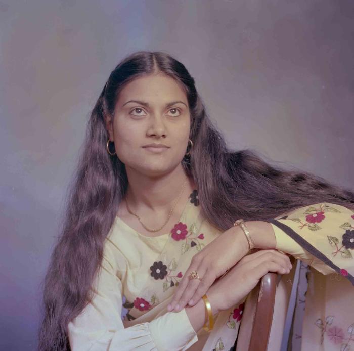 [Photo of Surjit Kingra]