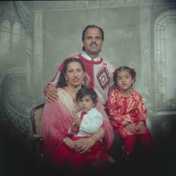[Photo of Balwant Kingra with family members]