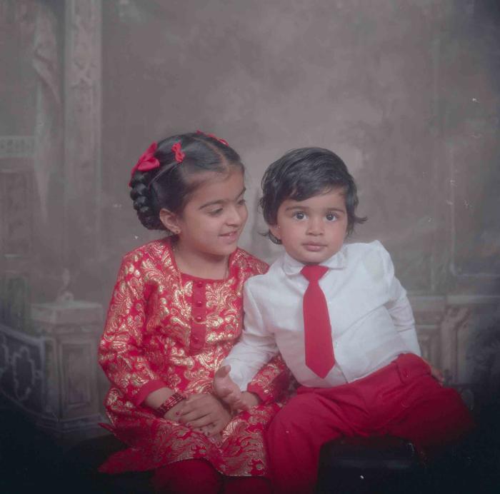 [Photo of young children]