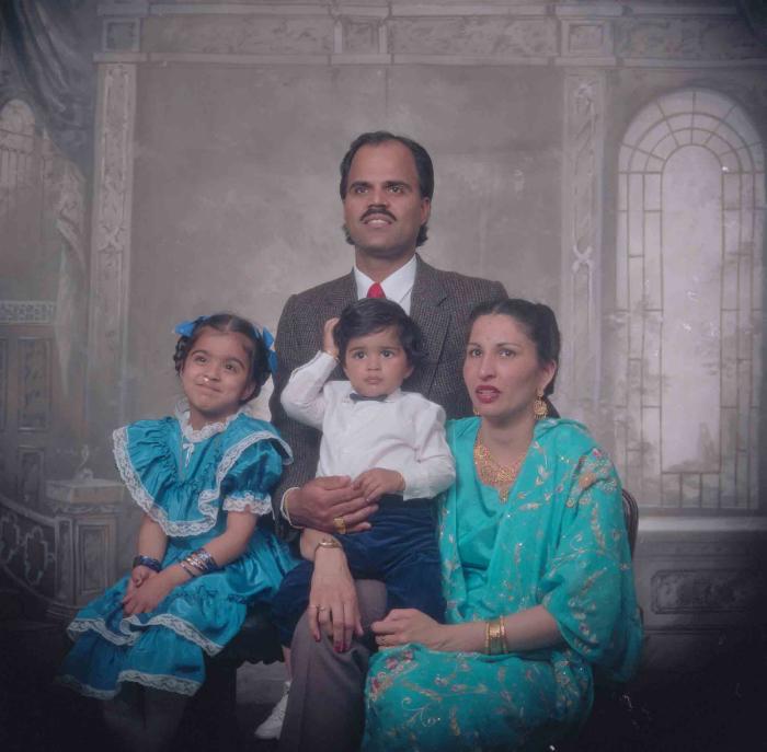 [Photo of Balwant Kingra with family members]