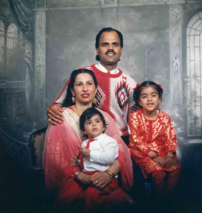 [Photo of Balwant Kingra with family members]