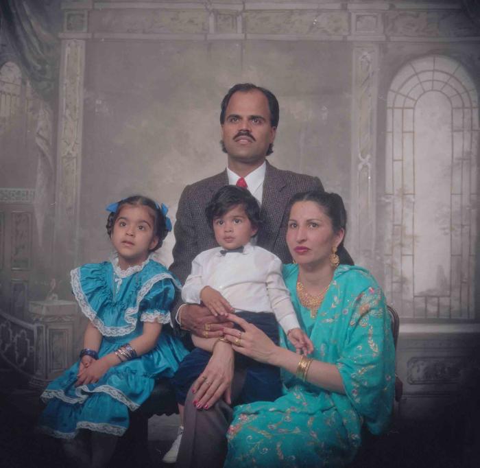 [Photo of Balwant Kingra with family members]