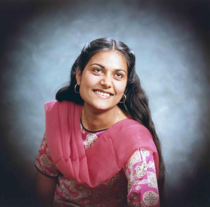 [Photo of Surjit Kingra]