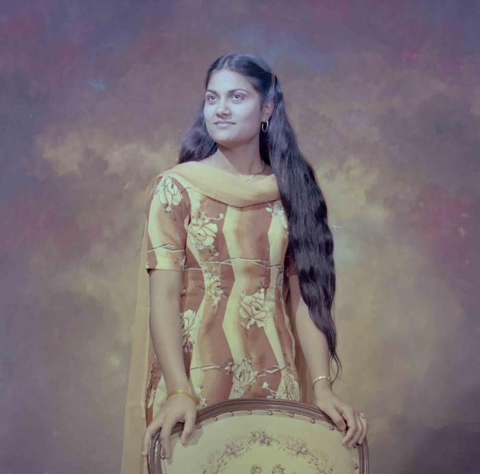 [Photo of Surjit Kingra]