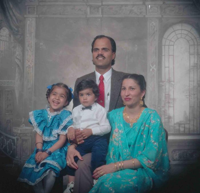 [Photo of Balwant Kingra with family members]