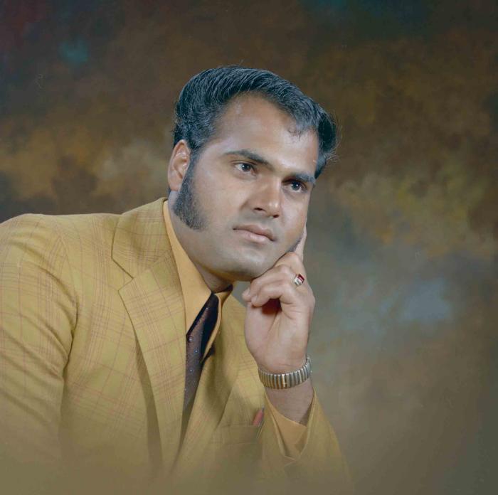 [Photo of an unidentified man]