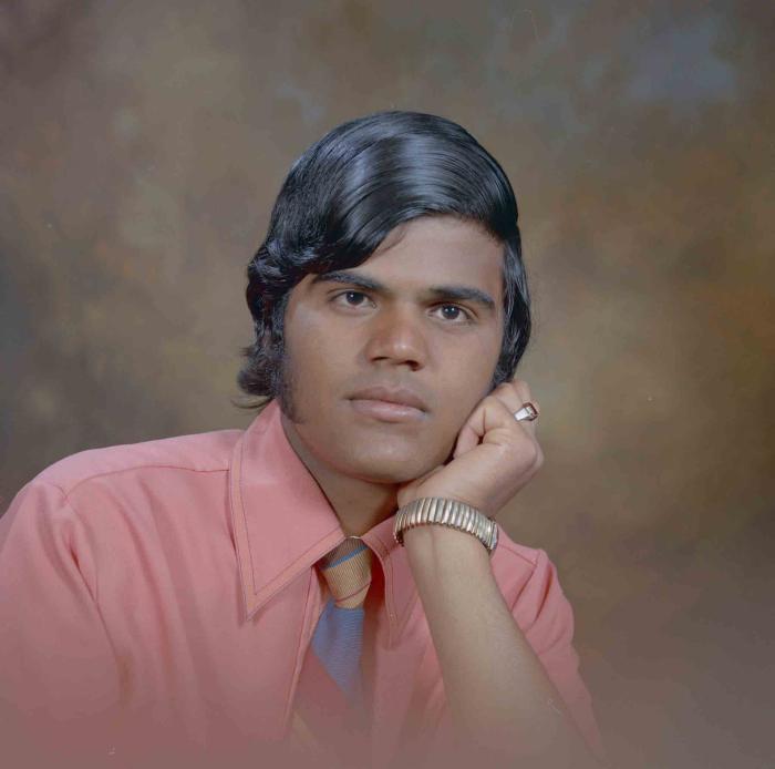 [Photo of an unidentified man]