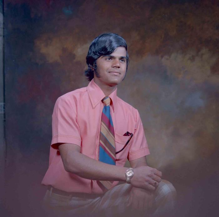 [Photo of an unidentified man]