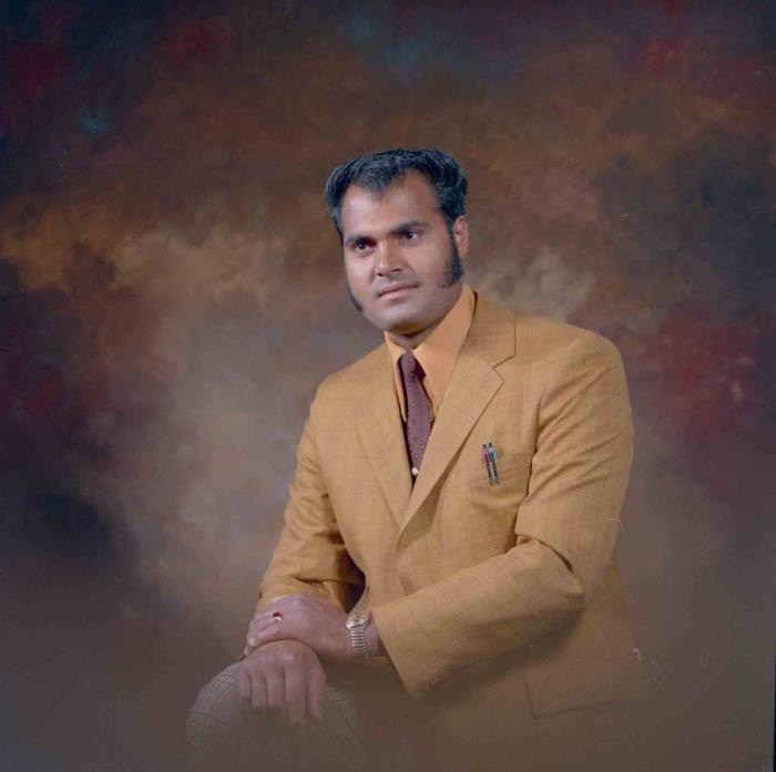 [Photo of an unidentified man]