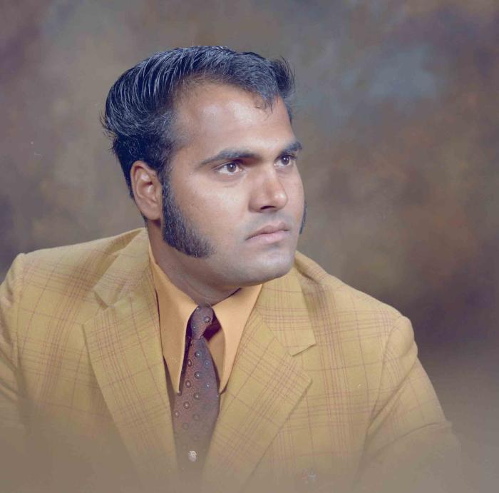 [Photo of an unidentified man]