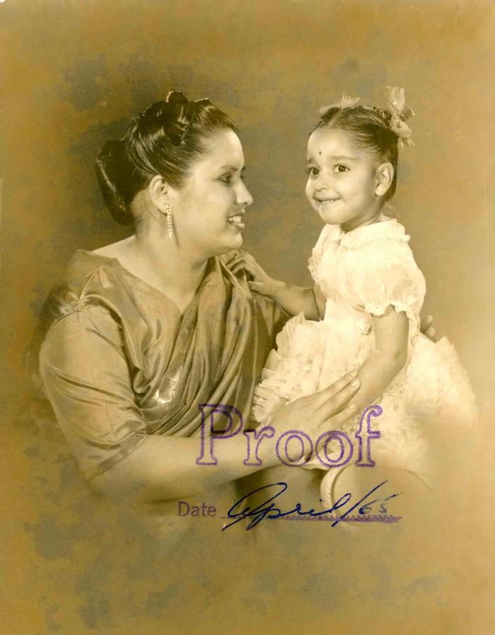 [Photo of Sarjit Kaur with a young child]