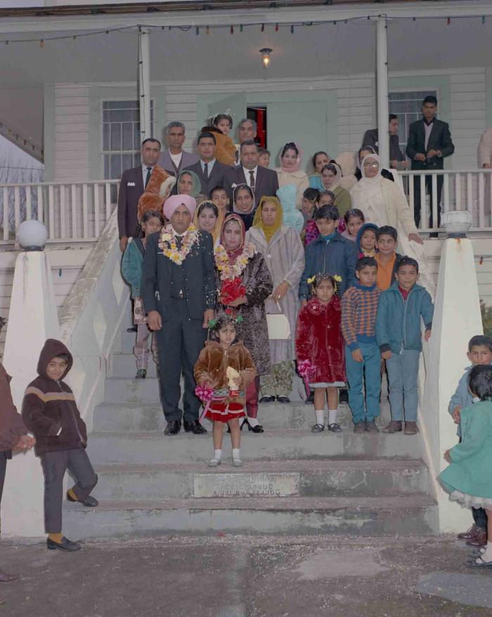 [Photo of S. Sheema Lal with husband and family]