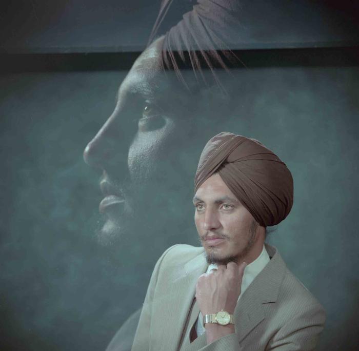 [Photo of Manjit Lally]