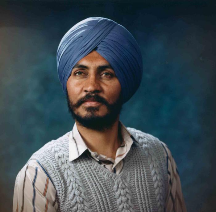 [Photo of Santokh]