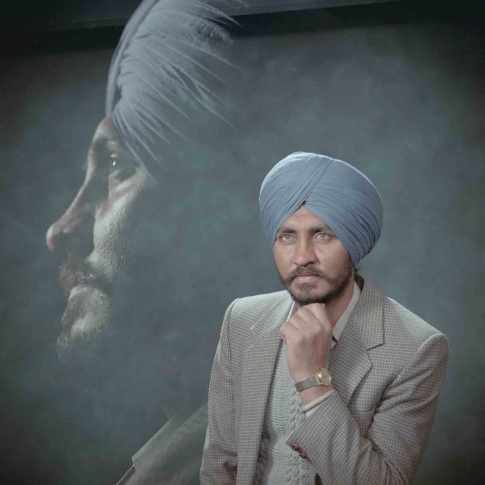 [Photo of Santokh]