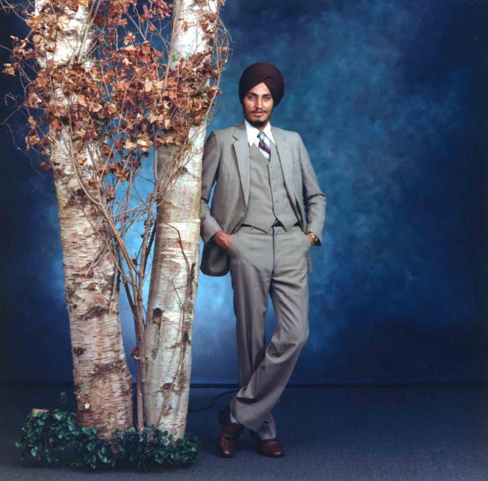 [Photo of Manjit Lally]