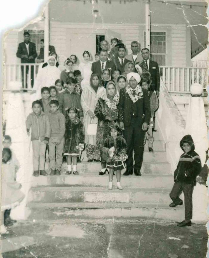 [Photo of S. Sheema Lal with husband and family]