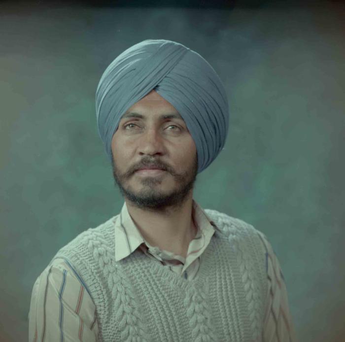 [Photo of Santokh]