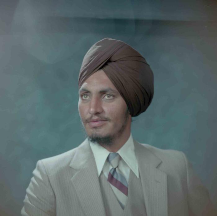 [Photo of Manjit Lally]