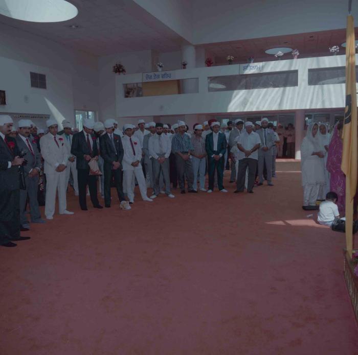 [Group photo of wedding guests]