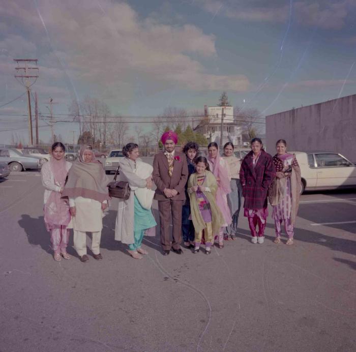 [Photo of Iqbal Mahol with wedding guests]