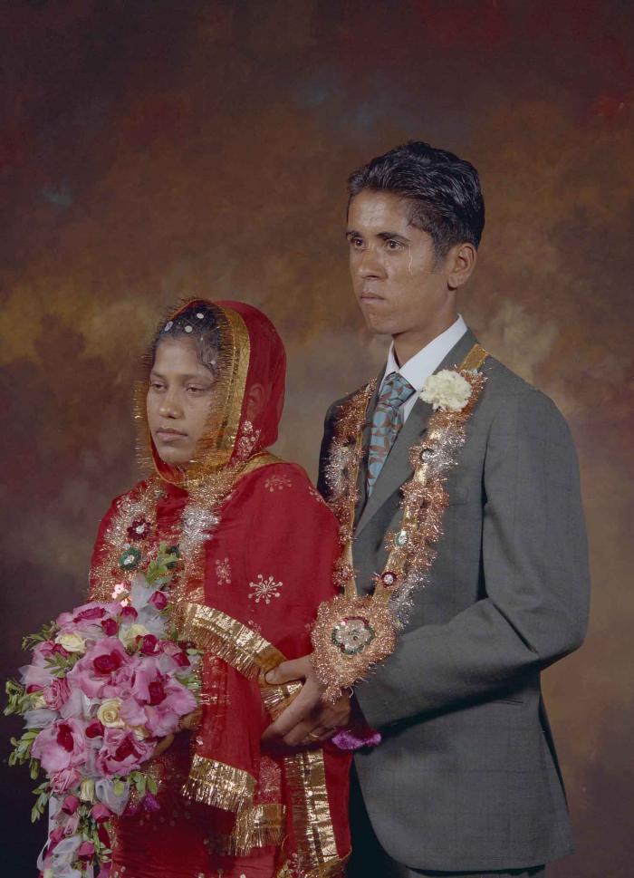 [Portrait of unidentified bride and groom]