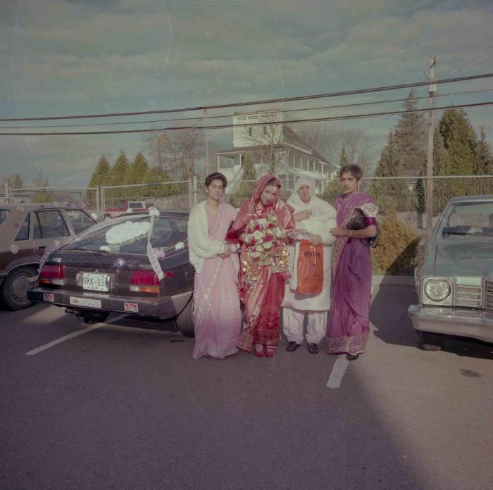 [Photo of the Manjinder Nagra with wedding guests]