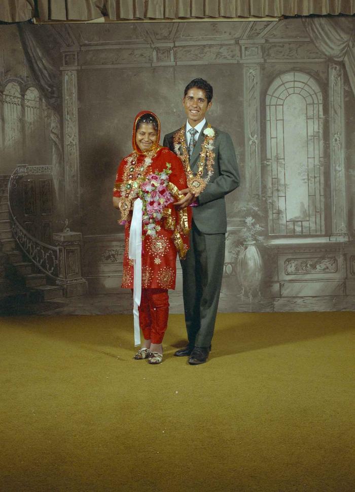 [Portrait of unidentified bride and groom]