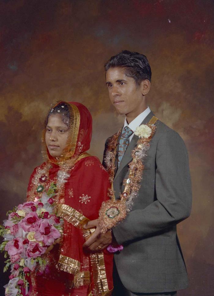 [Portrait of unidentified bride and groom]