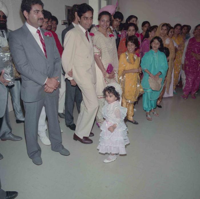 [Group photo of wedding guests]