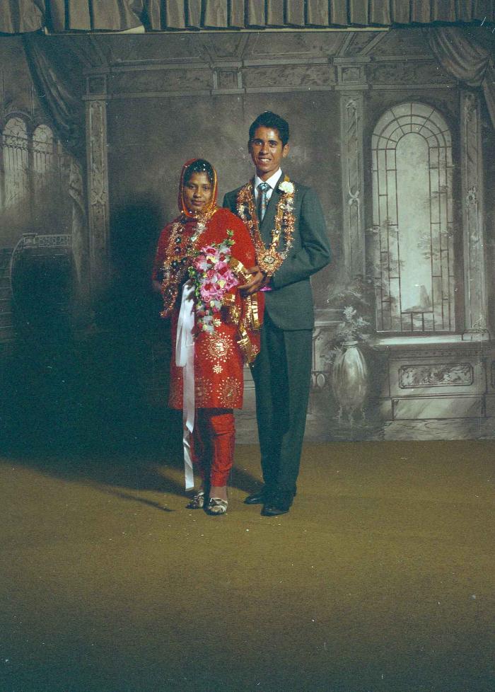 [Portrait of unidentified bride and groom]