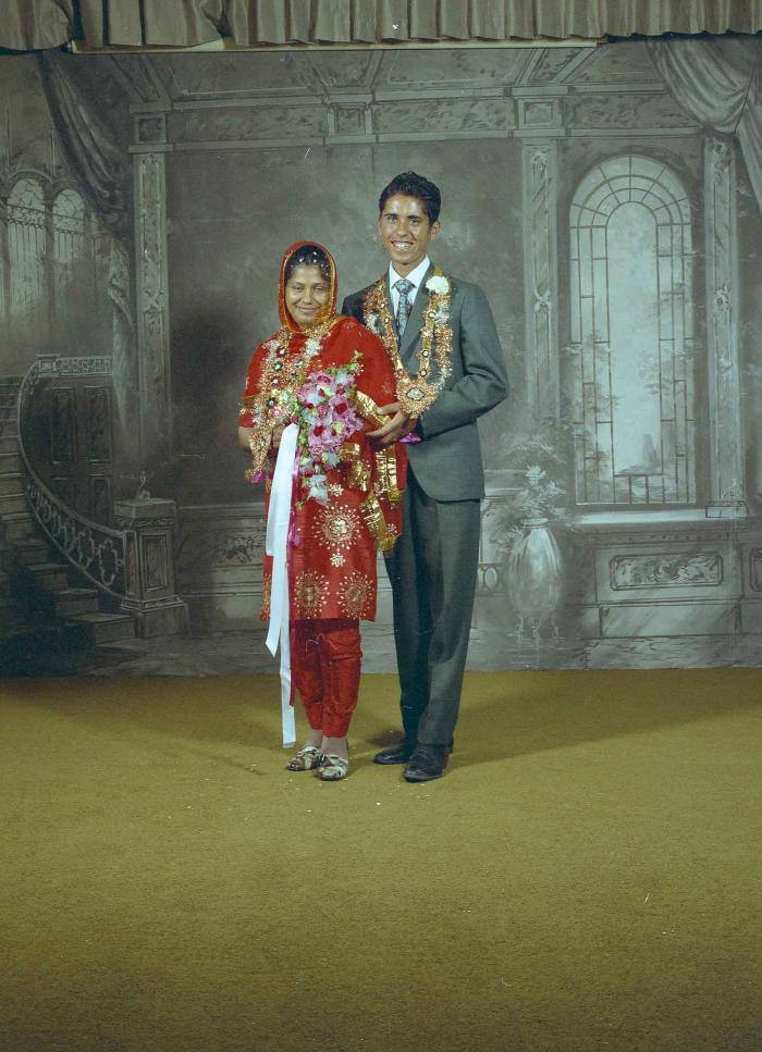 [Portrait of unidentified bride and groom]