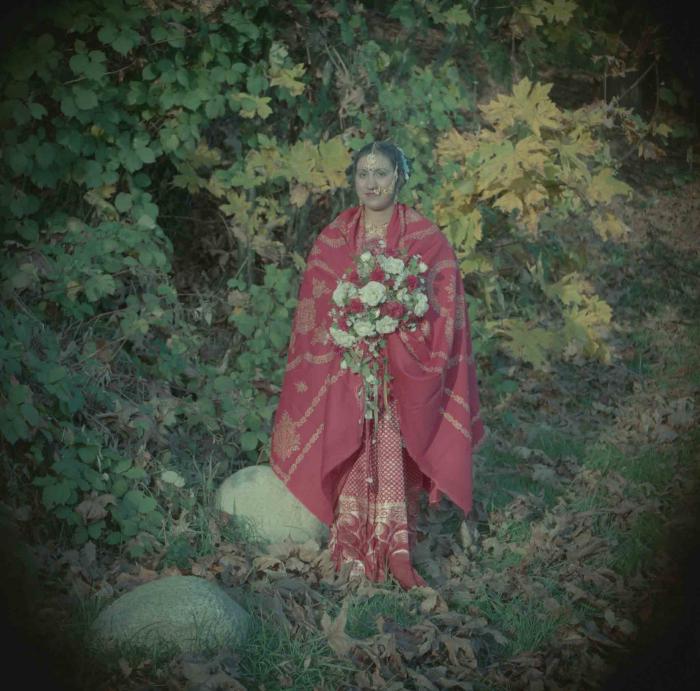 [Photo of the bride]