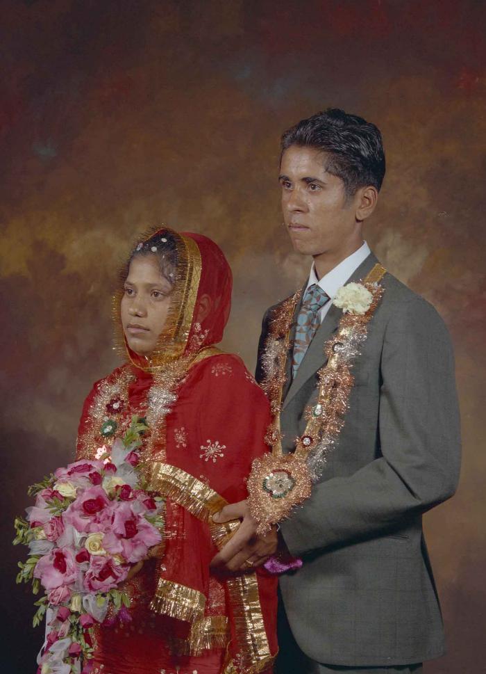 [Portrait of unidentified bride and groom]