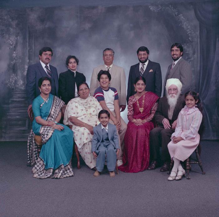 [Group photo of Mukhtiar Nager and family members]