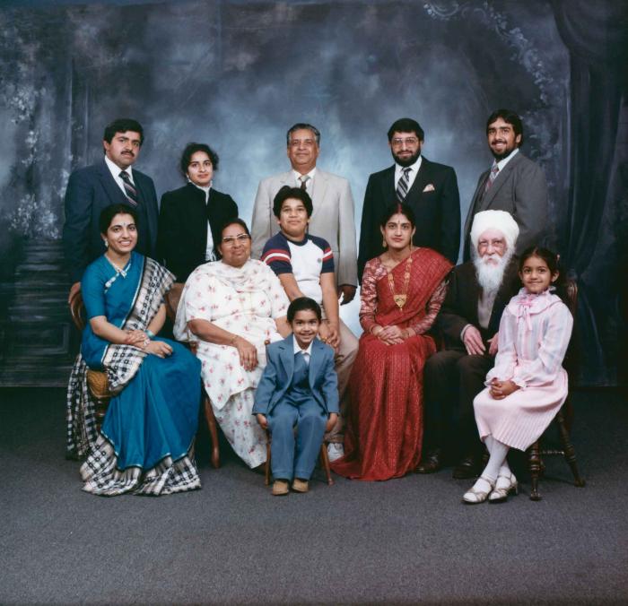 [Group photo of Mukhtiar Nager and family members]