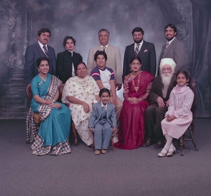 [Group photo of Mukhtiar Nager and family members]