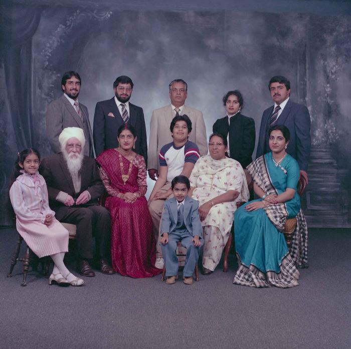 [Group photo of Mukhtiar Nager and family members]