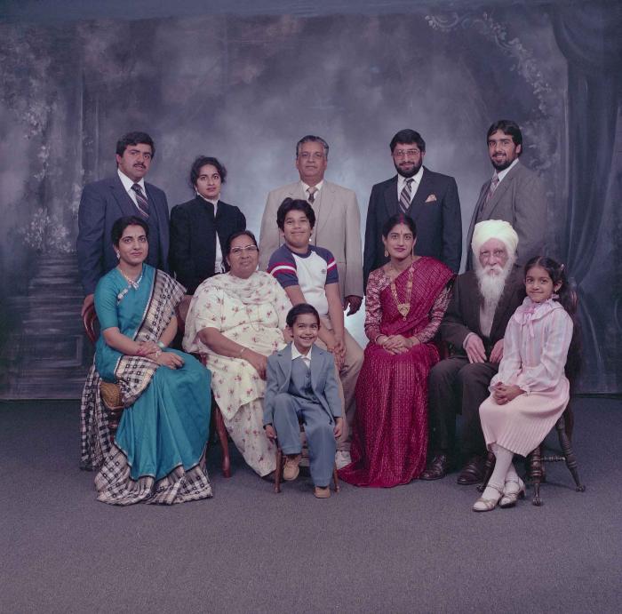[Group photo of Mukhtiar Nager and family members]