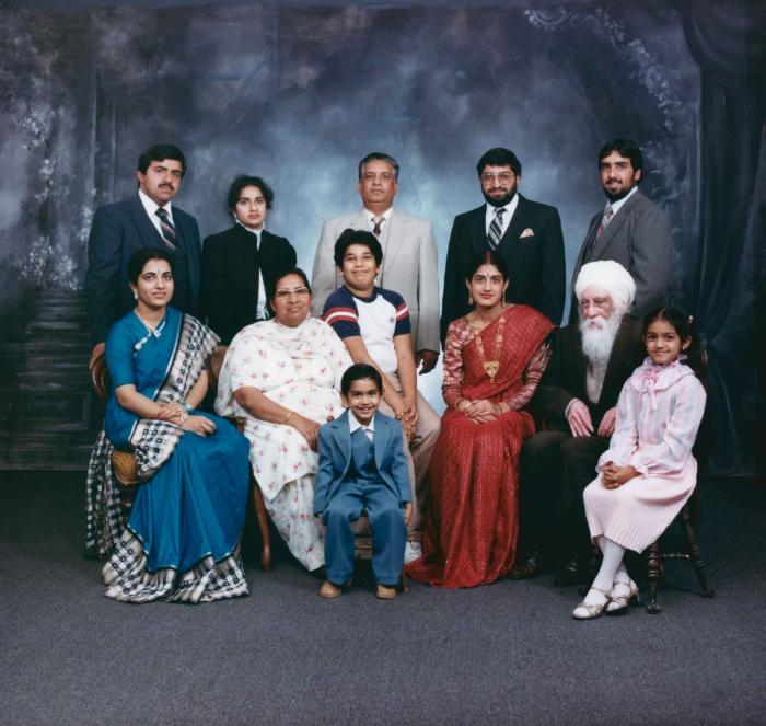 [Group photo of Mukhtiar Nager and family members]