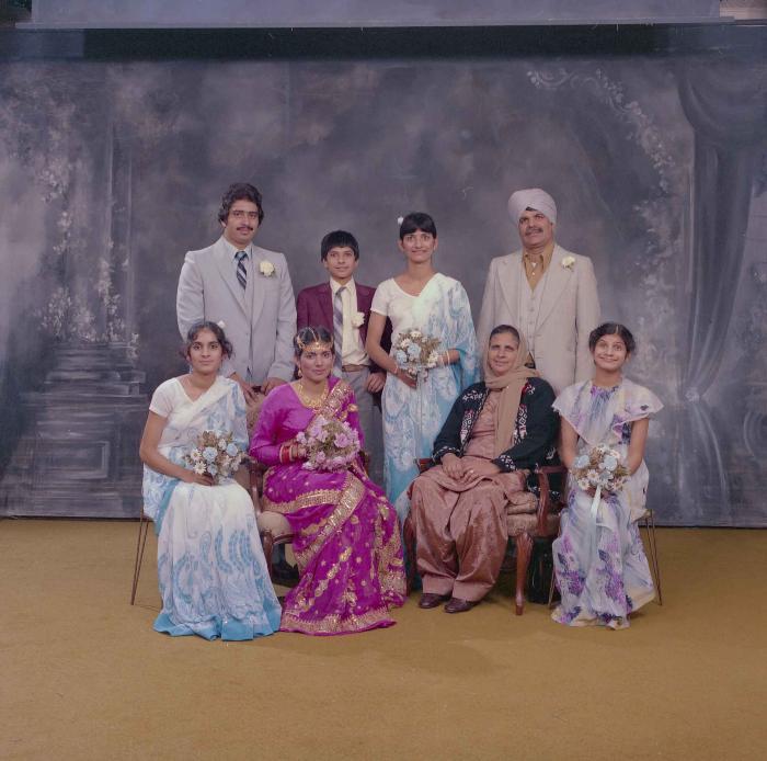 [Group photo of Balbu Sunner and Yashpal Nagra with their family members]