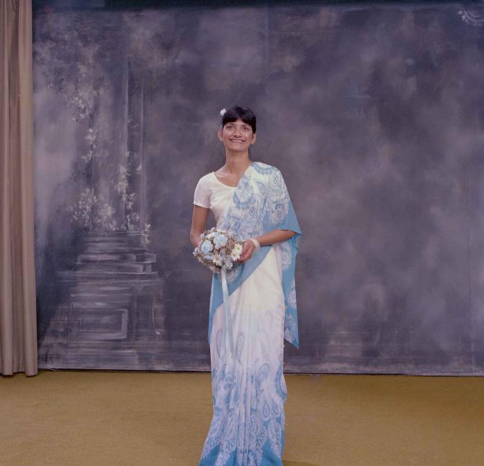 [Photo of a bridesmaid]