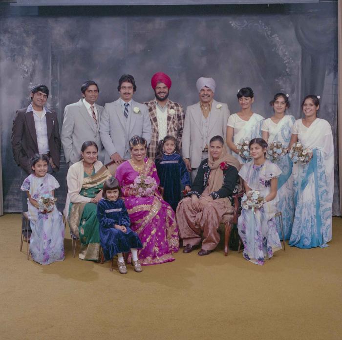[Group photo of Balbu Sunner and Yashpal Nagra with their family members]