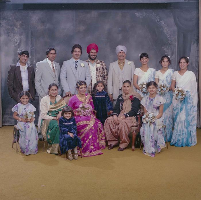 [Group photo of Balbu Sunner and Yashpal Nagra with their family members]