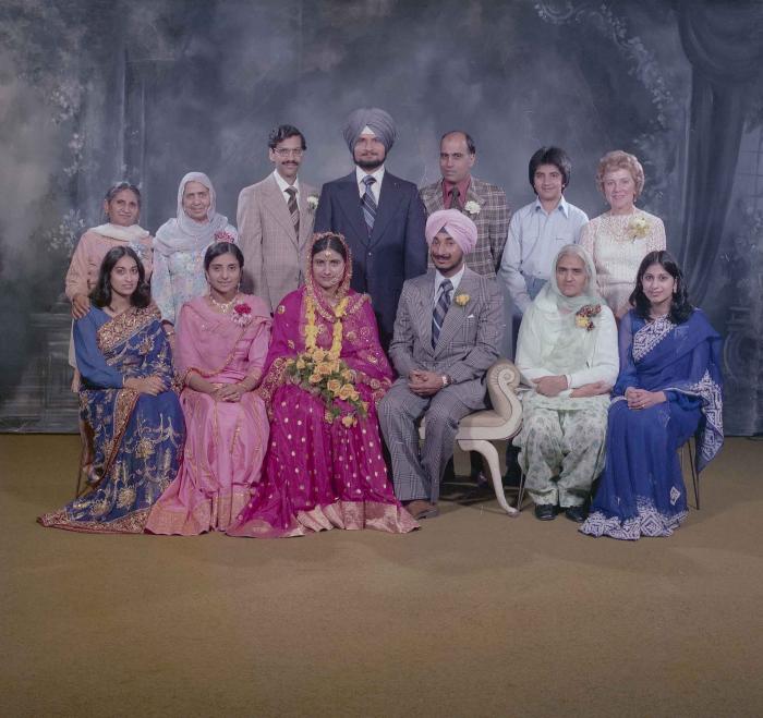 [Group photo of Joginder Thind and Parminder Grewal]