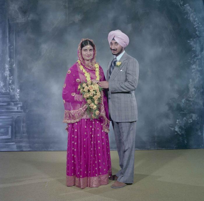 [Photo of Joginder Thind and Parminder Grewal]