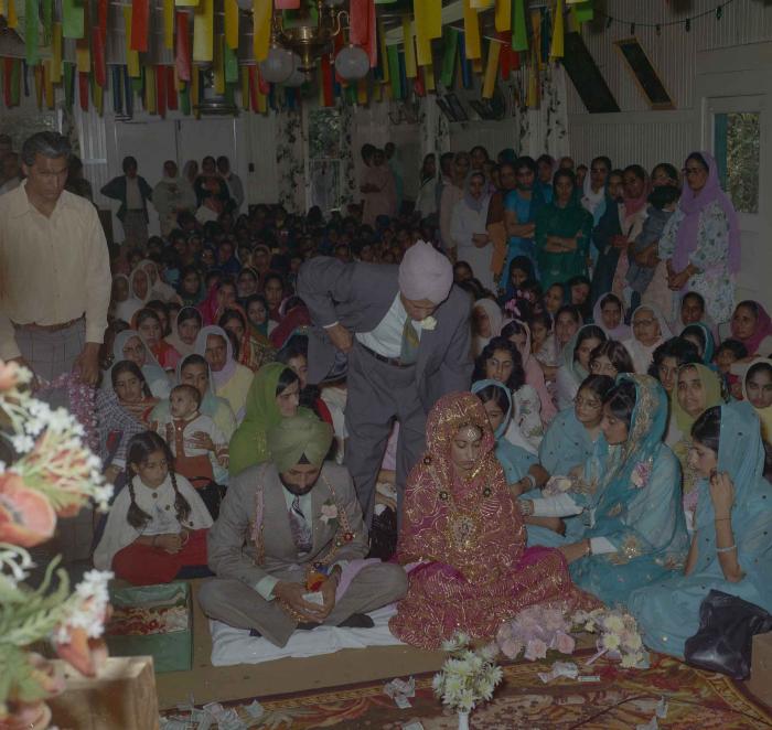 [Photo of Onkar Brar and Malkit Gill]