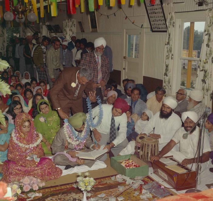 [Photo of Onkar Brar and Malkit Gill]